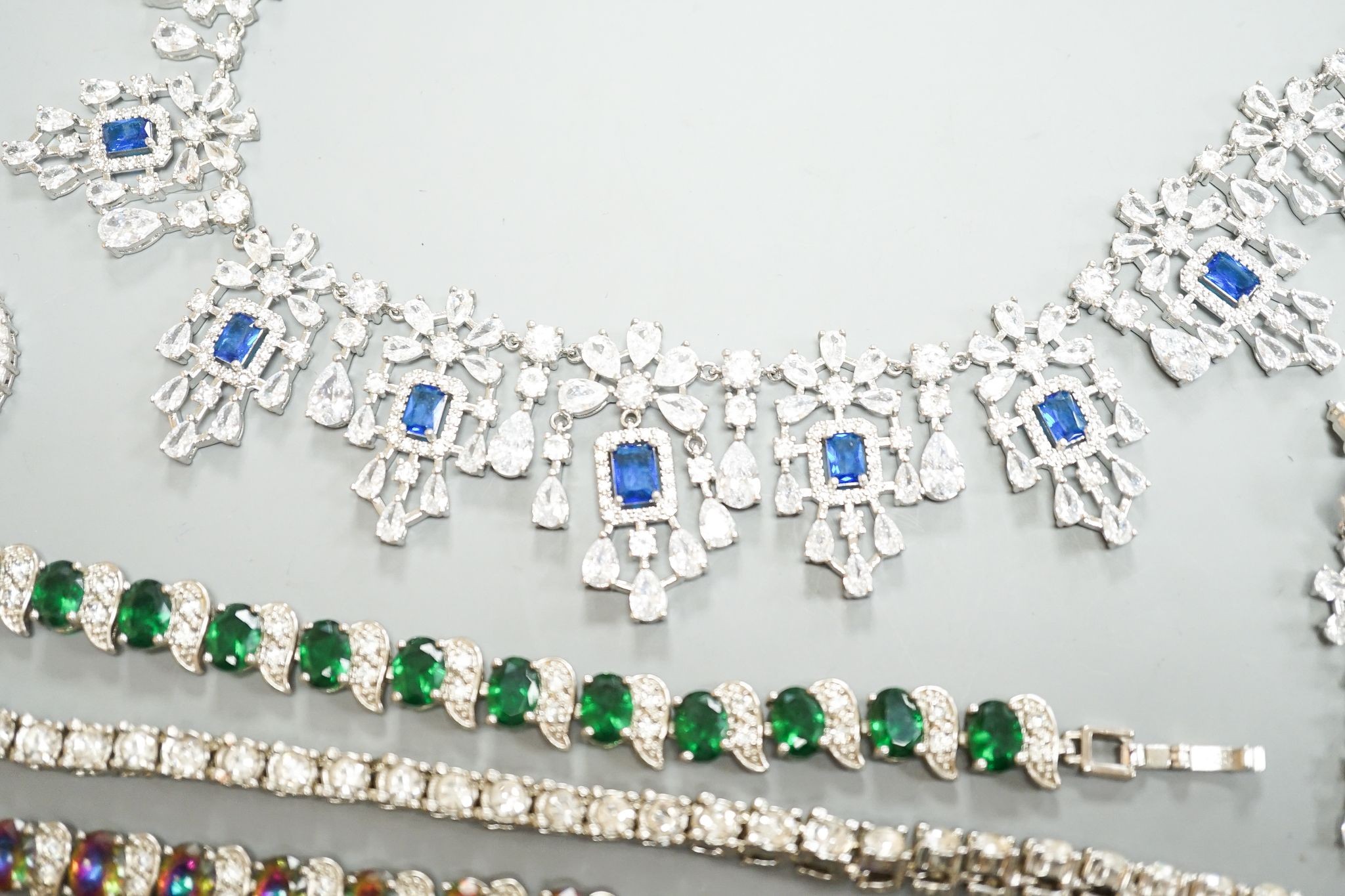 A small group of 925 or white metal and paste set jewellery, including necklaces, bracelets and earrings.